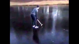 Golfer falls into frozen over lake.