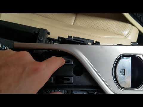 Part of a video titled Jaguar XF Electrical Shifter Removal - YouTube