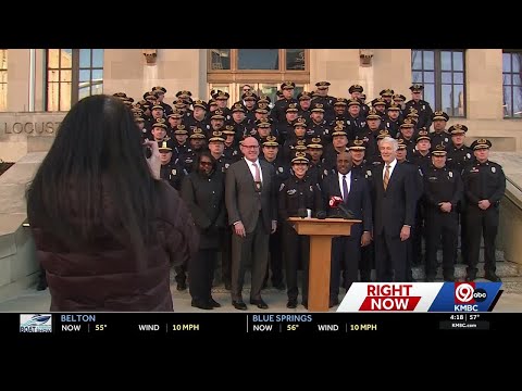 Kansas City police officers debut new navy blue uniforms
