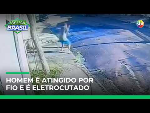 Homem recebe descarga elétrica após fio de poste cair enquanto caminhava na rua | #SeLigaBrasil