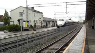 preview picture of video '[NSB] Regiontog from Trondheim S. to Oslo S. arriving at Heimdal station.'