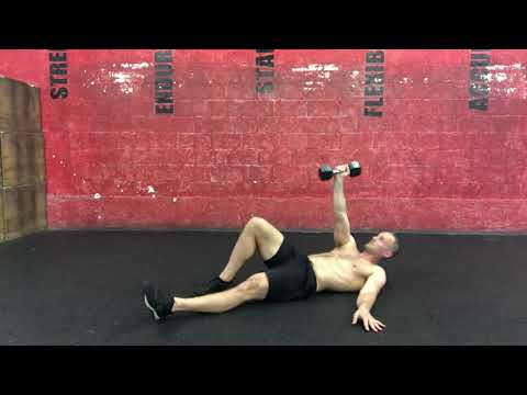 One arm dumbbell sit-up to support