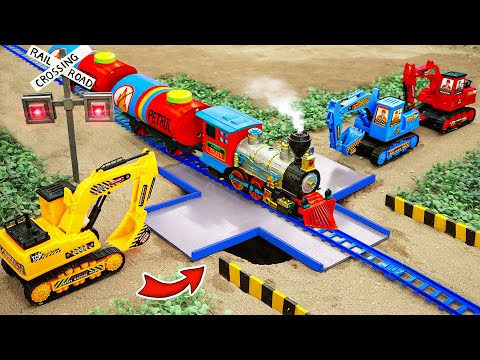 Máy xúc, ô tô trộn bê tông, xe công trình xây cầu cho tàu hỏa | Bé cá ô tô đồ chơi