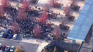 Protesters outside Kristi Noem ICE press conference [AERIALS]