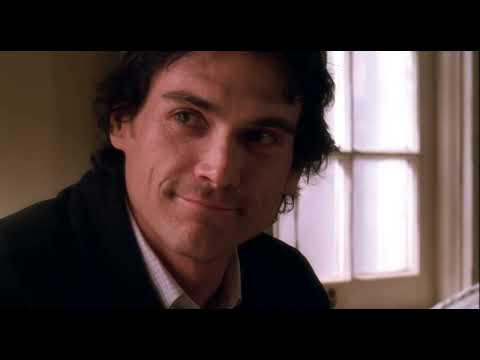 Trailer moment: father and son on the riverbank, framed like a folk tale