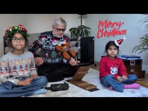 Kamalbir Singh plays Christmas greetings with granddaughters