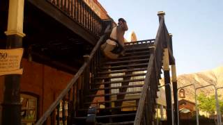 Stunt fall down stairs