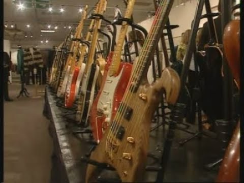 A impressive collection of guitars, stage costumes and awards from the collection of the late John E