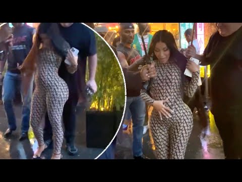 Cardi B says 'I'm pregnant' as she leaves restaurant during trip to Paris with Offset
