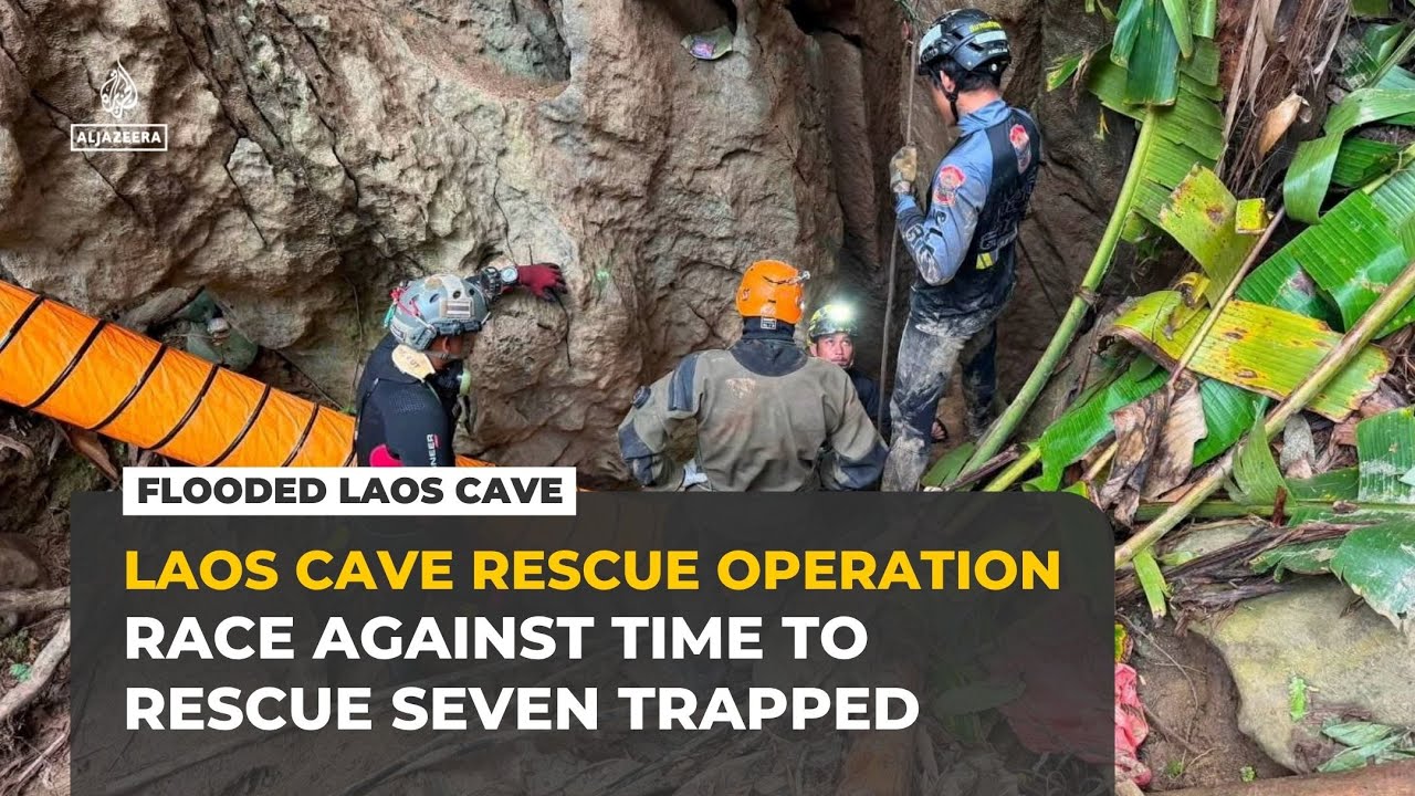 Rescuers race against time to reach seven trapped in flooded Laos cave