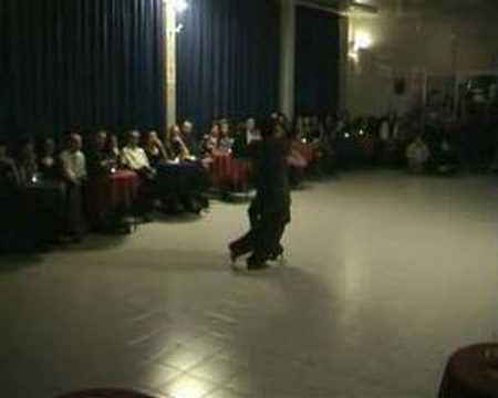  Vilma Fabiana Vega  and  Fernando Galera  are  dancing  to  the  milonga  "  Saca Chipas  "