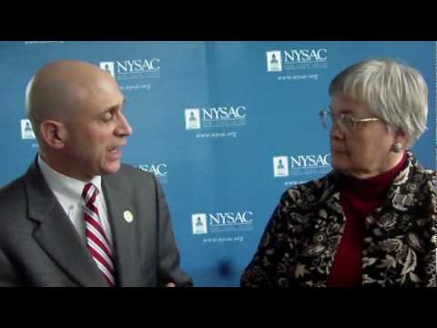 NYSAC Executive Director Stephen Acquario and Genesee County Legislator Esther Leadly