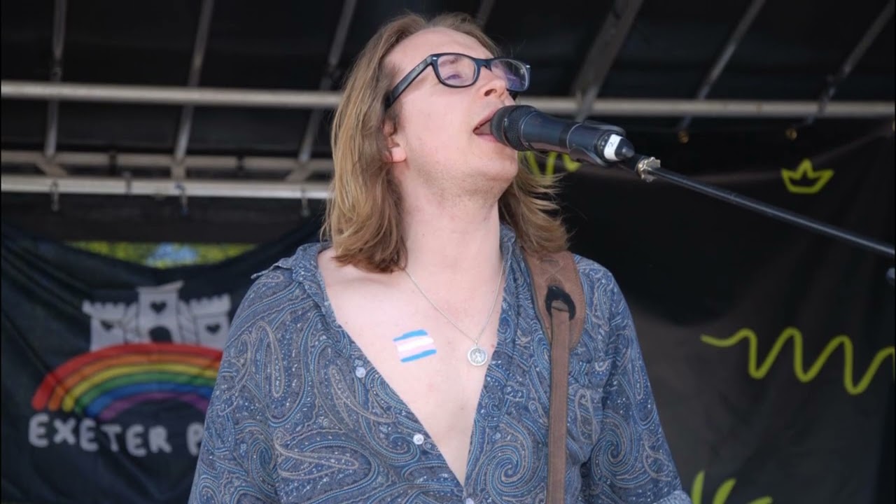 Exeter Devon Gay LGBTQIA Pride 2025 Main stage Poppyshow  Band 10th May 2025.