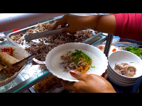pork porridge and fish porridge - $0.75 for a bowl - Cambodian street food