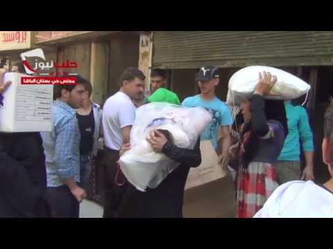 توزيع المعونات الإغاثية في بستان الباشا في محافظة حلب من قبل مجلس محافظة حلب