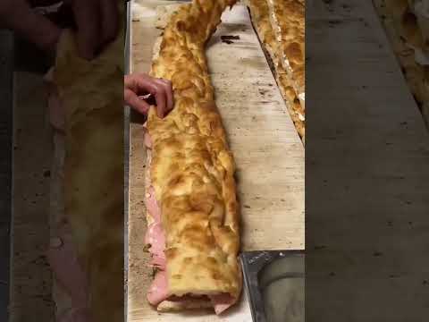 Forno Campo de Fiori’s pizza bianca is breakfast, lunch (when filled with mortadella), or snack.