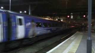 67021 tows 91125 (Sky 1 set) out of Kings Cross