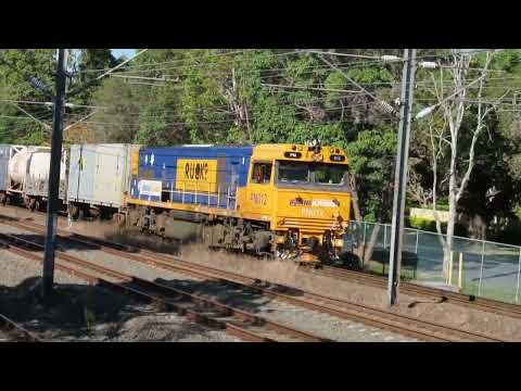 Pacific National Queensland loco PN 012 leads PN train 82P9 from Moolabin and through Graceville.