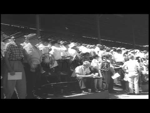 People gather in a large number to watch harness racing classic, the Hambletonian...HD Stock Footage