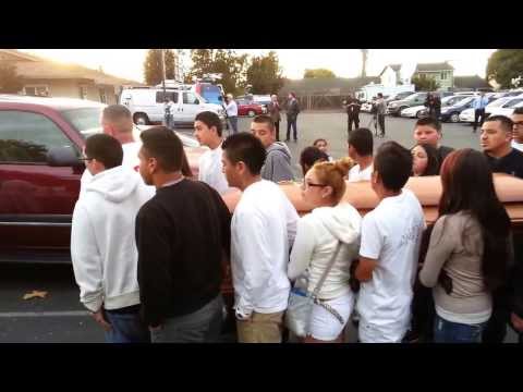 Andy Lopez being carried into the funeral mass