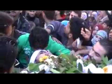 مشاركة الساروت في مظاهرة وتشييع محمد الشيخ في حي بابا عمرو في مدينة حمص