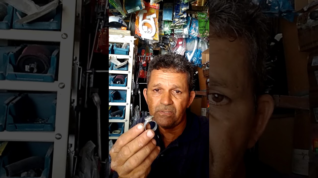 como apertar uma braçadeira de mangueira de fogão.