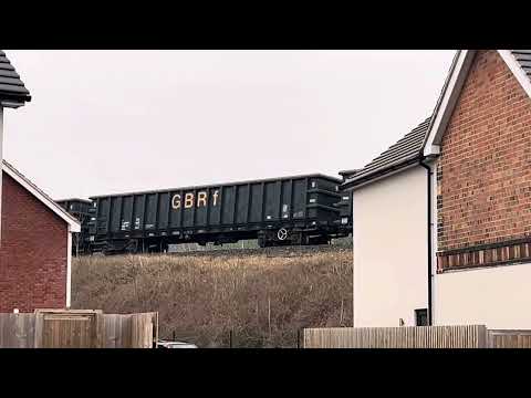 The GBRF shed loco crosses directly over the top of the bridge and between the houses 19/02/2025
