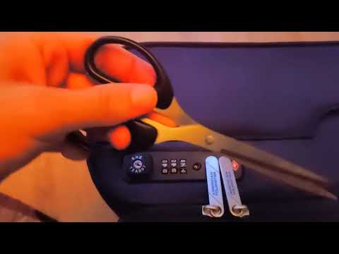 Come aprire una valigia con serratura TSA007,chiusa senza ricordarsi il PIN