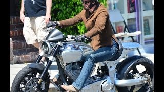 2014 Keanu Reeves rides a fancy chrome motorcycle with friends along Sunset Boulevard