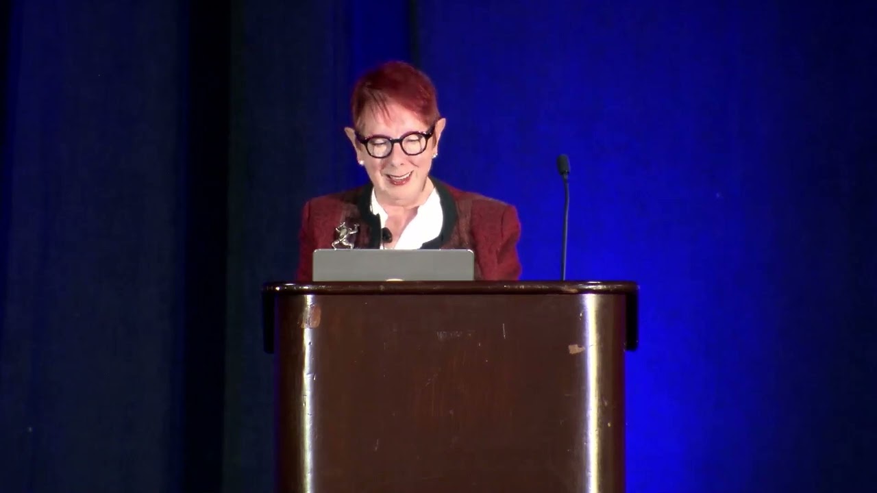 Jacqueline Wales delivering a keynote presentation