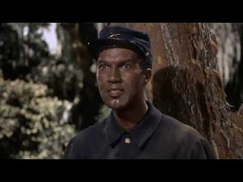 La Classe américaine (1993) | Julien Lepers déguisé en Noir