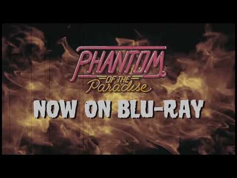 Trailer close-up: Phoenix under a single spotlight; audience suddenly still as 'Old Souls' blooms
