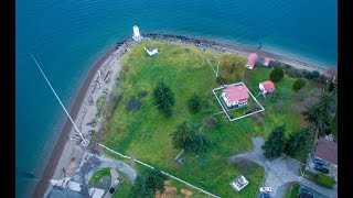 Tacoma - Browns Point Lighthouse - Scenic Park Aerial Fly Over - 4K UHD
