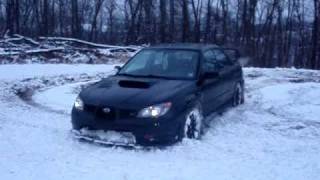 preview picture of video 'drifting my STI in my front yard'