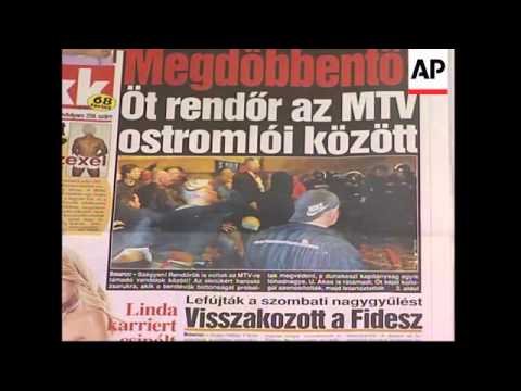 Street scenes, riot police on standby, headlines