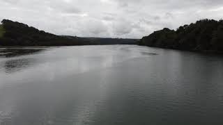 Laura paddle boarding on the river Torridge at Little America, from above.