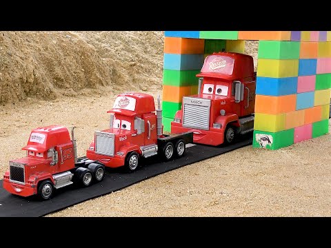 Rescue the mack truck from the magic gate with the police car - Toy car story