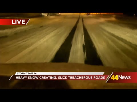 Heavy snow creating slick conditions