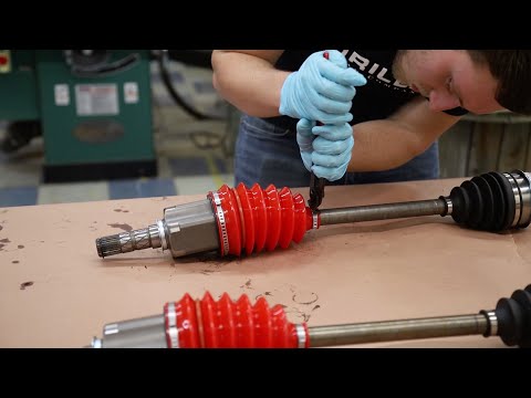 Installing high angle silicone CV axle boots for Toyota axles on Subaru axles!