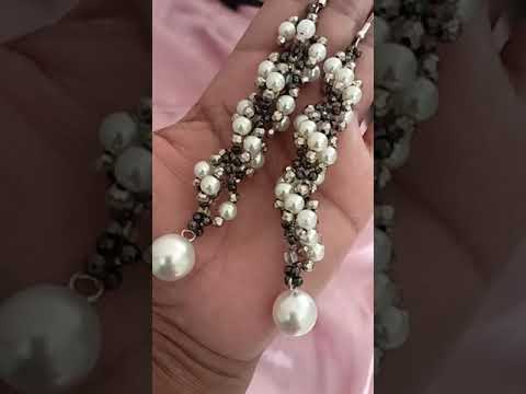 Beaded Spiral Earrings by saminzee/Shorts