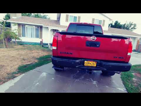 Nissan Titan 3 in lift on 20x12 wheels. 32 inch tire
