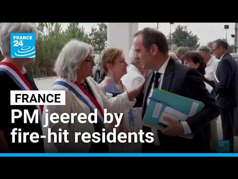 French PM announces support for fire-damaged villages after jeers from residents