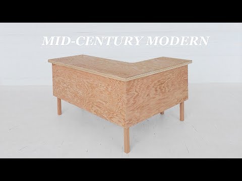 Part of a video titled How To Build an L-Shaped Executive Desk | DIY Woodworking - YouTube