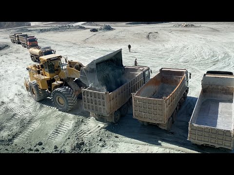 Caterpillar 990F Wheel Loader Loading Trucks With Two Passes