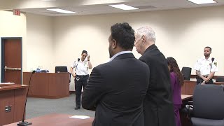 Twelve men arraigned in high-end brothel case
