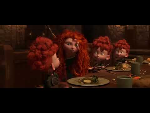 Brave trailer still: Merida and Queen Elinor in close, torchlight between them