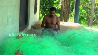 Fisherman mending Fishing Net, Andaman