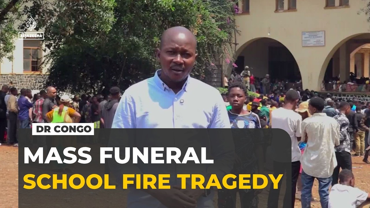 DR Congo holds mass funeral for 29 killed in school fire