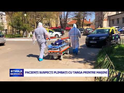 PACIENTI SUSPECTI PLIMBATI CU TARGA PRINTRE MASINI