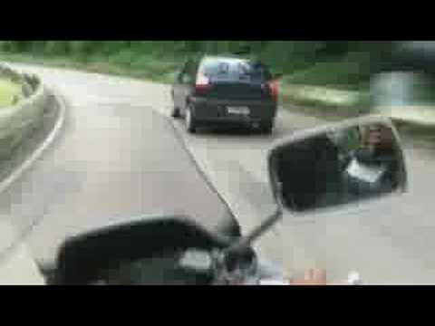 Na garupa da moto com Toni Garrido